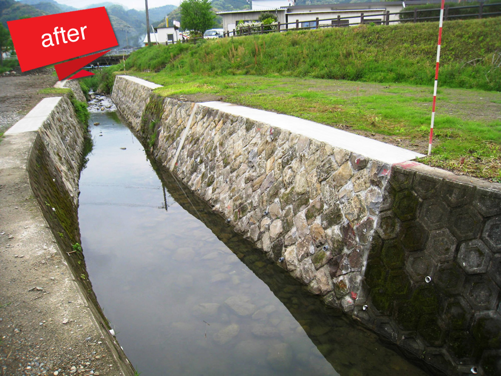 西郷川河川等災害復旧工事 完成（水害にて既設石積が崩壊した箇所を災害復旧しました。）